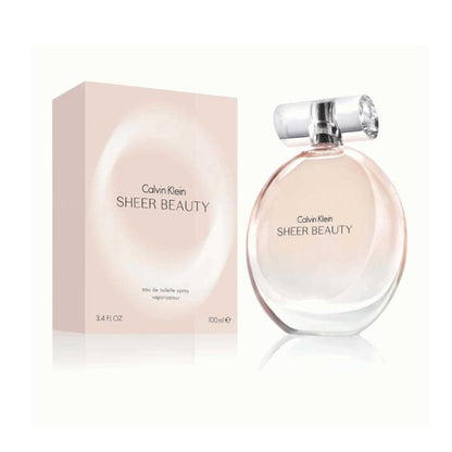 A translucent pink glass perfume bottle with a silver cap, featuring the Calvin Klein Sheer Beauty logo. The bottle contains CK Sheer Beauty Eau de Toilette, with a volume of 100ml.