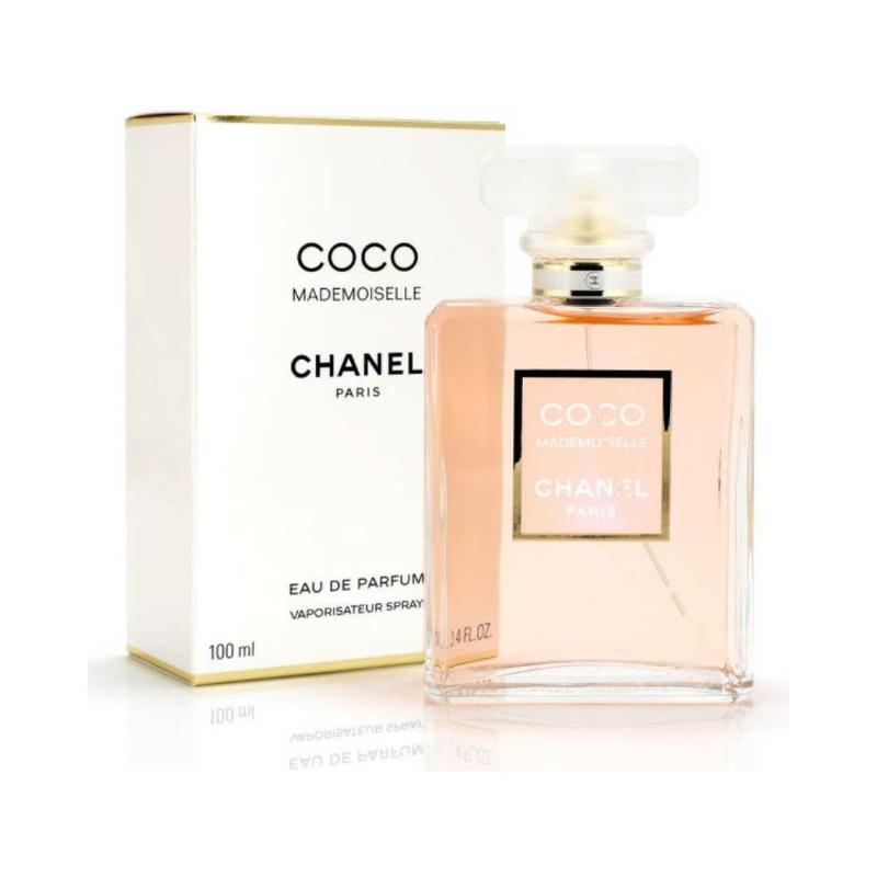 A transparent glass perfume bottle with a gold cap, featuring the Coco Mademoiselle logo. The bottle contains Coco Mademoiselle Eau de Parfum 100ML.