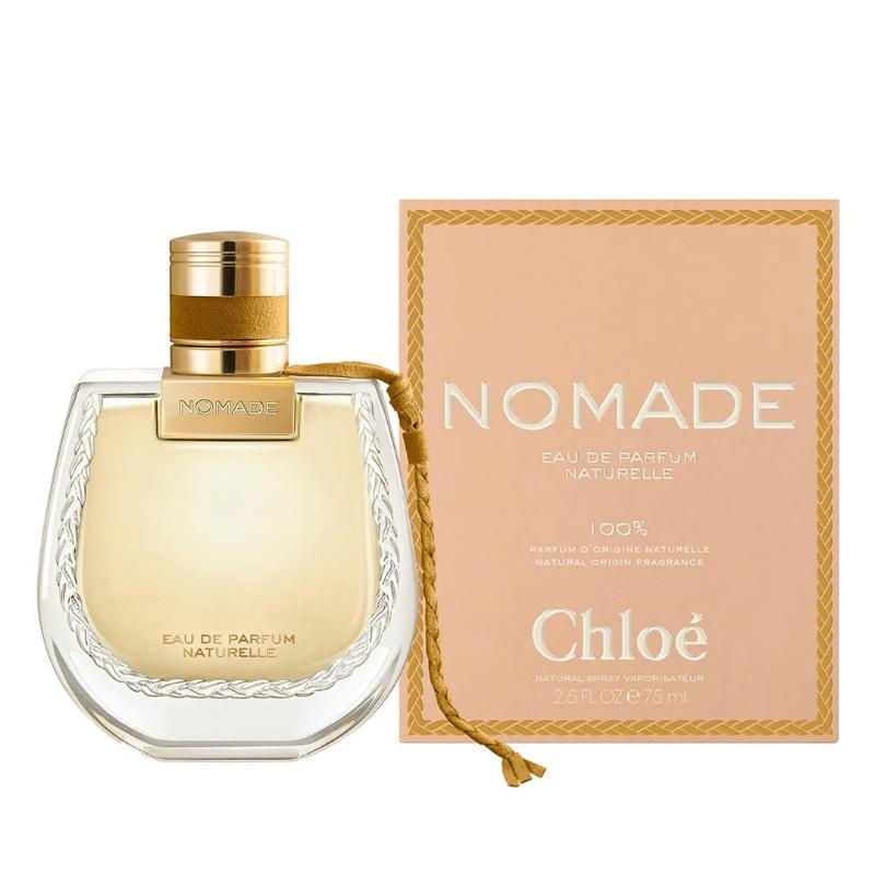 A rectangular glass perfume bottle with a rose gold cap, featuring the Chloé Nomade logo. The bottle contains Chloé Nomade Eau de Parfum, with a volume of 75ml.