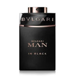 A sleek black glass perfume bottle with a silver cap, featuring the Bvlgari logo. The bottle contains Bvlgari Man in Black Eau de Parfum, with a volume of 100ml.   