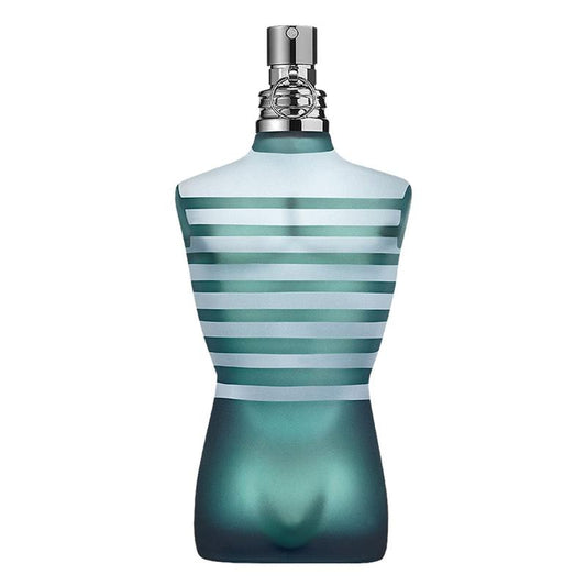 A blue glass perfume bottle shaped like a male torso, containing Jean Paul Gaultier Le Male Eau de Toilette.