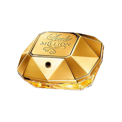 A luxurious, diamond-shaped perfume bottle with a golden cap. The perfume is Paco Rabanne Lady Million, a floral and fruity fragrance for women.